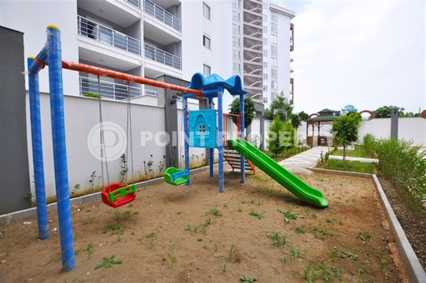 Уютная квартира с двумя спальнями в Махмутларе-id-9130-фото-10