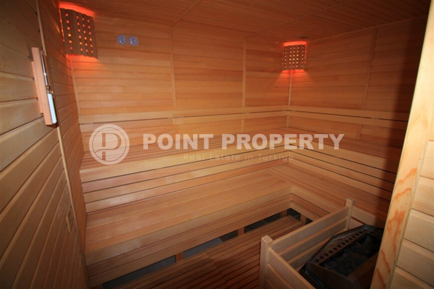 Уютная квартира с двумя спальнями в Махмутларе-id-9130-фото-12