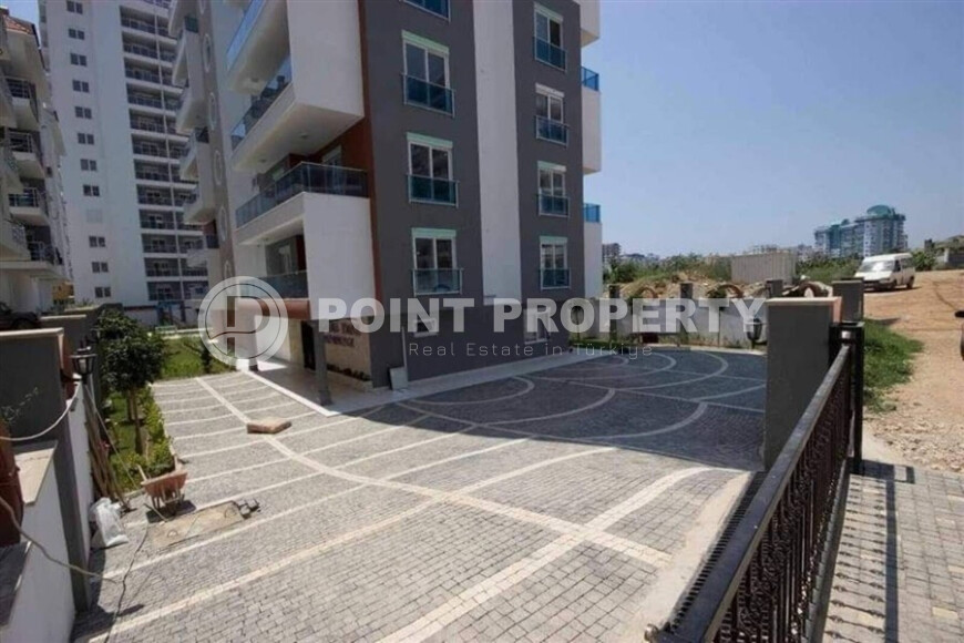 Уютная квартира с двумя спальнями в Махмутларе-id-9130-фото-18