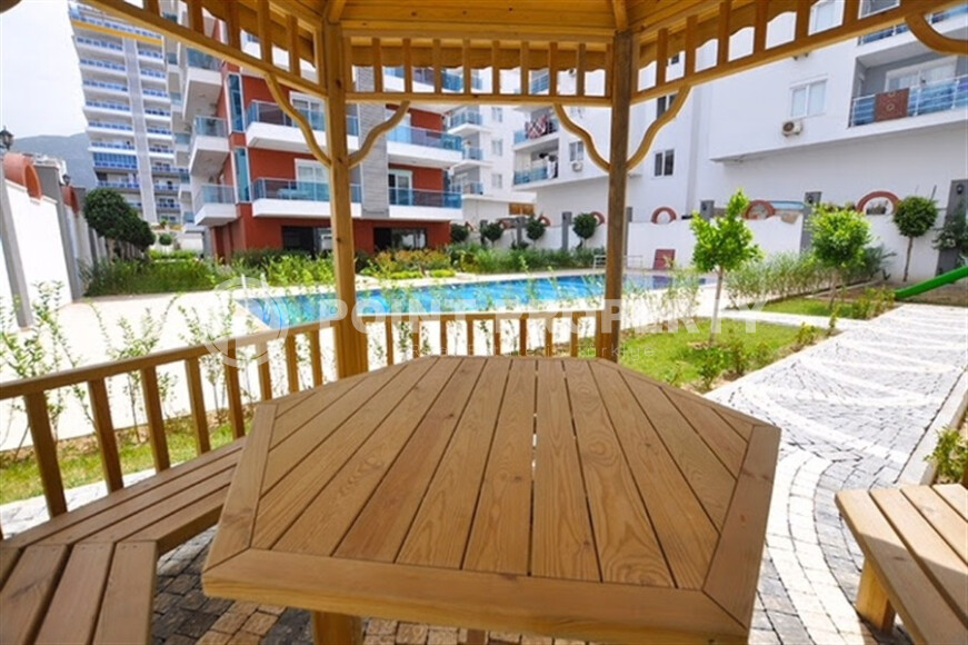 Уютная квартира с двумя спальнями в Махмутларе-id-9130-фото-19