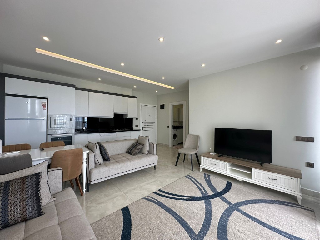 Стильная квартира 60 м² в Махмутларе с панорамным видом, на первой линии-id-9150-фото-2