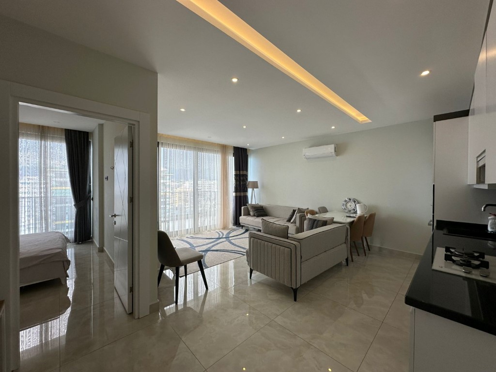 Стильная квартира 60 м² в Махмутларе с панорамным видом, на первой линии-id-9150-фото-4