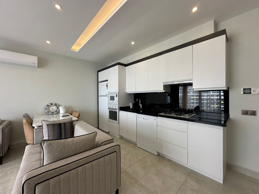 Стильная квартира 60 м² в Махмутларе с панорамным видом, на первой линии-id-9150-фото-6