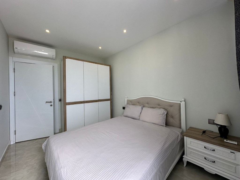 Стильная квартира 60 м² в Махмутларе с панорамным видом, на первой линии-id-9150-фото-7