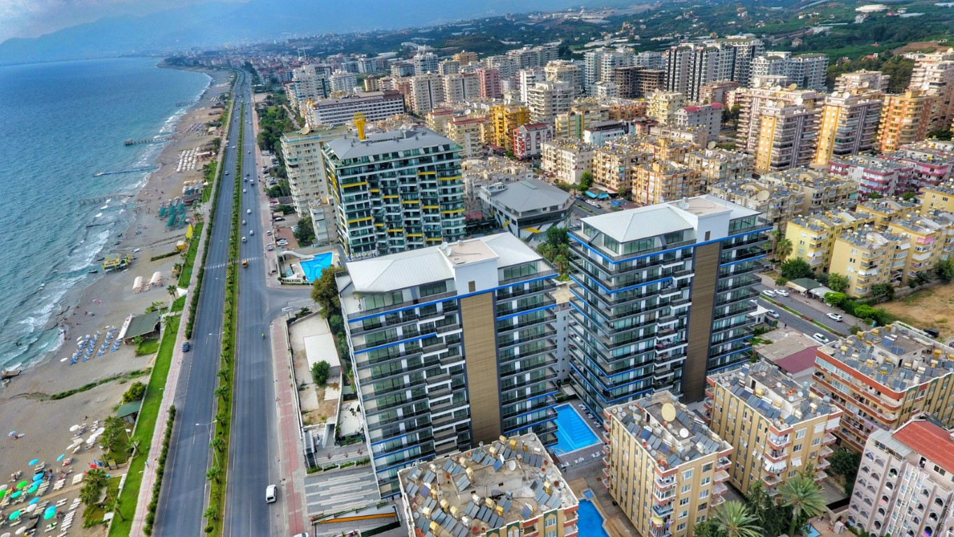 Стильная квартира 60 м² в Махмутларе с панорамным видом, на первой линии-id-9150-фото-11