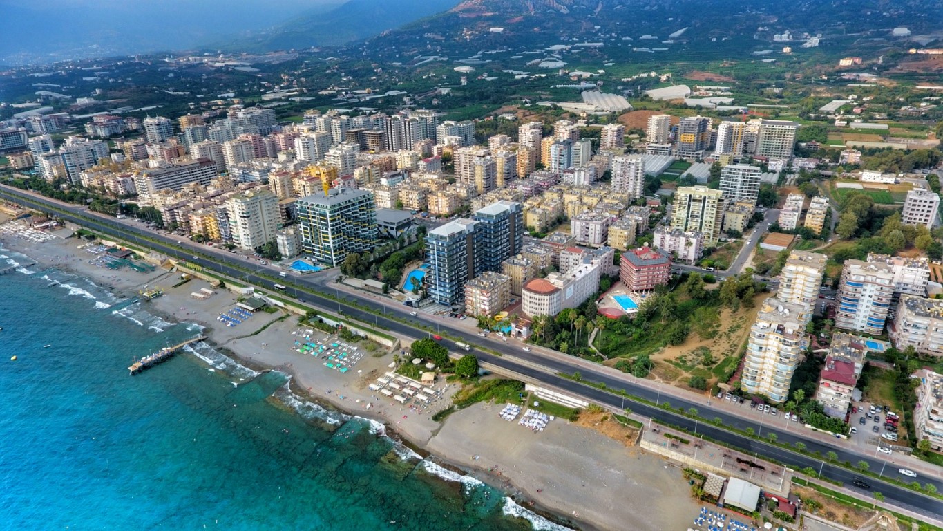 Стильная квартира 60 м² в Махмутларе с панорамным видом, на первой линии-id-9150-фото-17