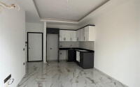 Современная квартира 50 м² в Махмутларе-id-9151-фото-5