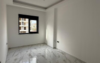 Современная квартира 50 м² в Махмутларе-id-9151-фото-6