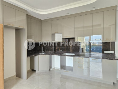 Современная квартира 1+1 с площадью 58 м² в Махмутларе-id-9172-фото-3