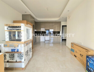 Современная квартира 1+1 с площадью 58 м² в Махмутларе-id-9172-фото-5