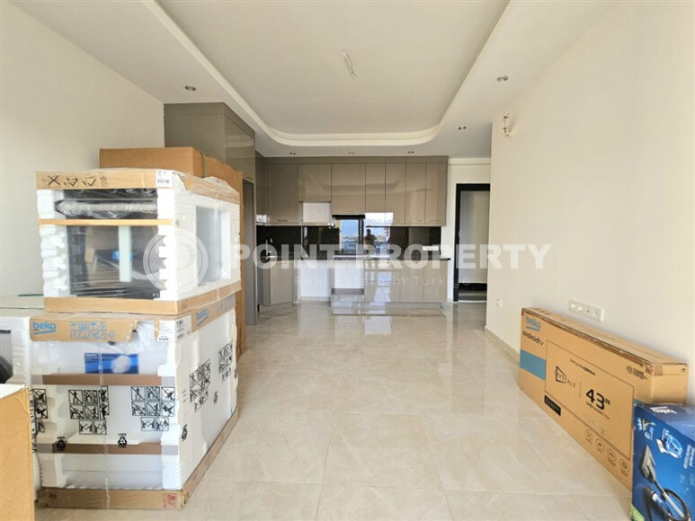 Современная квартира 1+1 с площадью 58 м² в Махмутларе-id-9172-фото-5