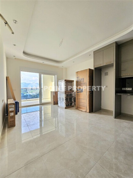 Современная квартира 1+1 с площадью 58 м² в Махмутларе-id-9172-фото-6