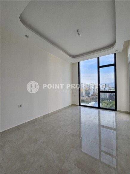 Современная квартира 1+1 с площадью 58 м² в Махмутларе-id-9172-фото-8