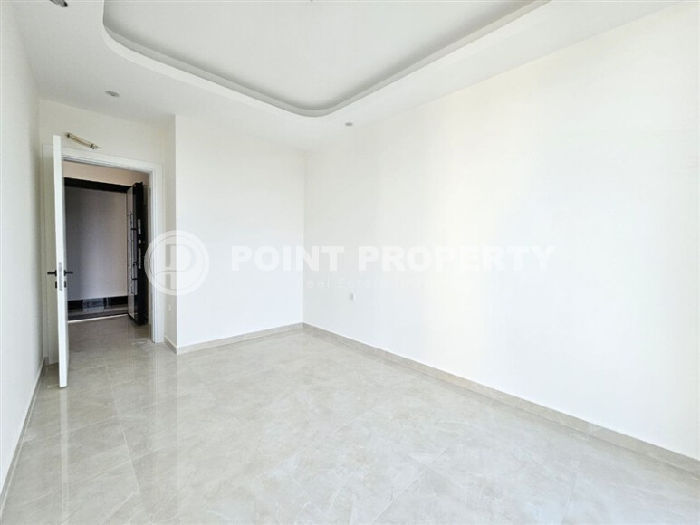 Современная квартира 1+1 с площадью 58 м² в Махмутларе-id-9172-фото-10