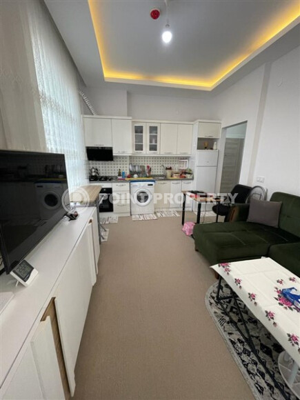 Квартира 1+1 в шаговой доступности к морю в районе Махмутлар-id-9189-фото-3