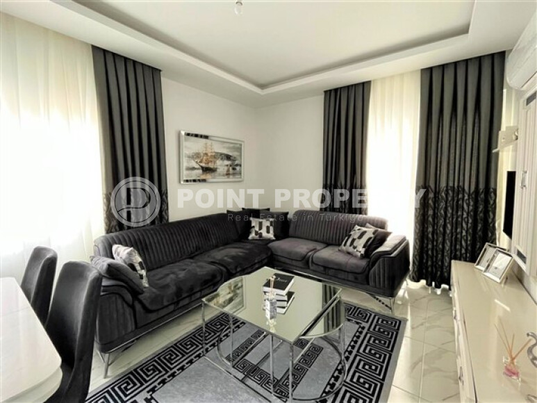 Modern apartments in Mahmutlar with furniture and appliances 55 sq.m.-id-9203-photo-1