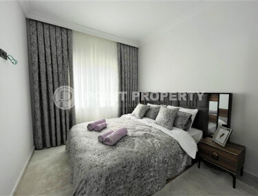 Современные апартаменты в Махмутларе с мебелью и техникой 55 кв.м.-id-9203-фото-4