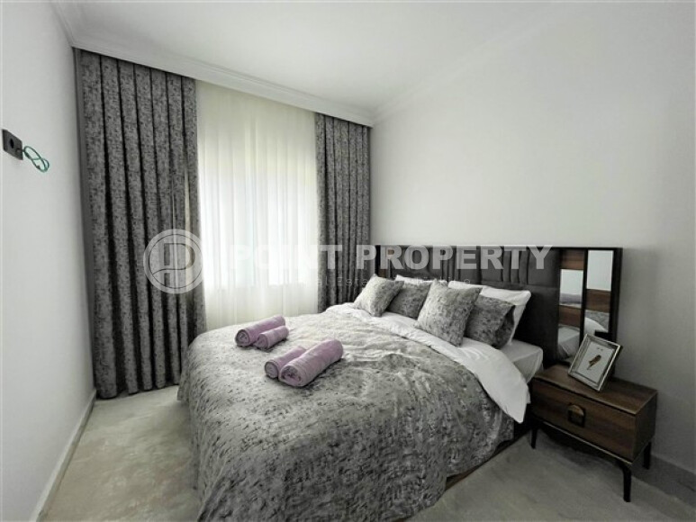 Современные апартаменты в Махмутларе с мебелью и техникой 55 кв.м.-id-9203-фото-4