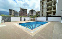Modern apartments in Mahmutlar with furniture and appliances 55 sq.m.-id-9203-photo-12