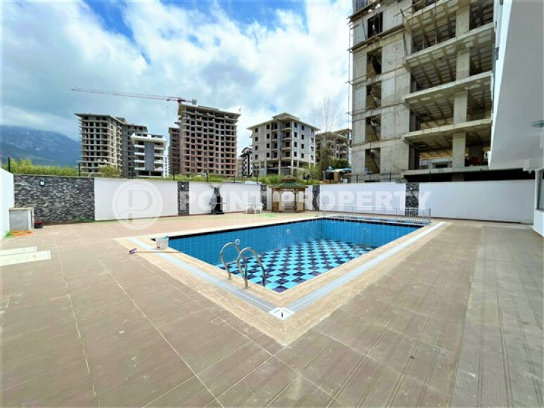 Modern apartments in Mahmutlar with furniture and appliances 55 sq.m.-id-9203-photo-12