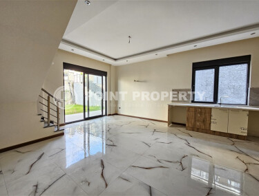 Просторный дублекс с личным садом  в новом доме в тихом районе Хасбахче-id-9205-фото-2