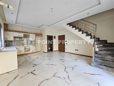 Просторный дублекс с личным садом  в новом доме в тихом районе Хасбахче-id-9205-фото-3