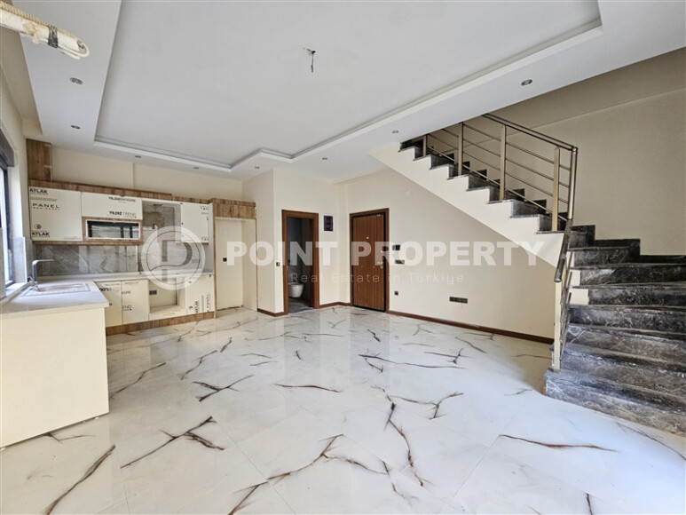 Просторный дублекс с личным садом  в новом доме в тихом районе Хасбахче-id-9205-фото-3