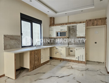 Просторный дублекс с личным садом  в новом доме в тихом районе Хасбахче-id-9205-фото-4