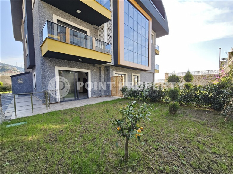 Просторный дублекс с личным садом  в новом доме в тихом районе Хасбахче-id-9205-фото-7