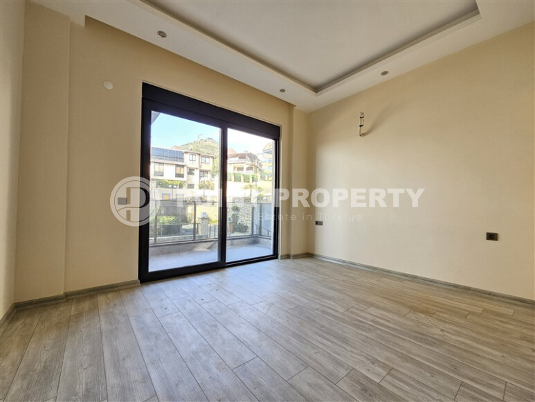 Просторный дублекс с личным садом  в новом доме в тихом районе Хасбахче-id-9205-фото-12