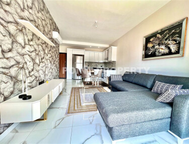 Недорогая квартира 1+1 с новой мебелью и дизайнерским ремонтом в районе Каргыджак-id-9220-фото-2