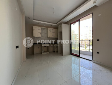 Квартира 1+1 в самом центре района Махмутлар у знаменитых часов-id-9235-фото-2