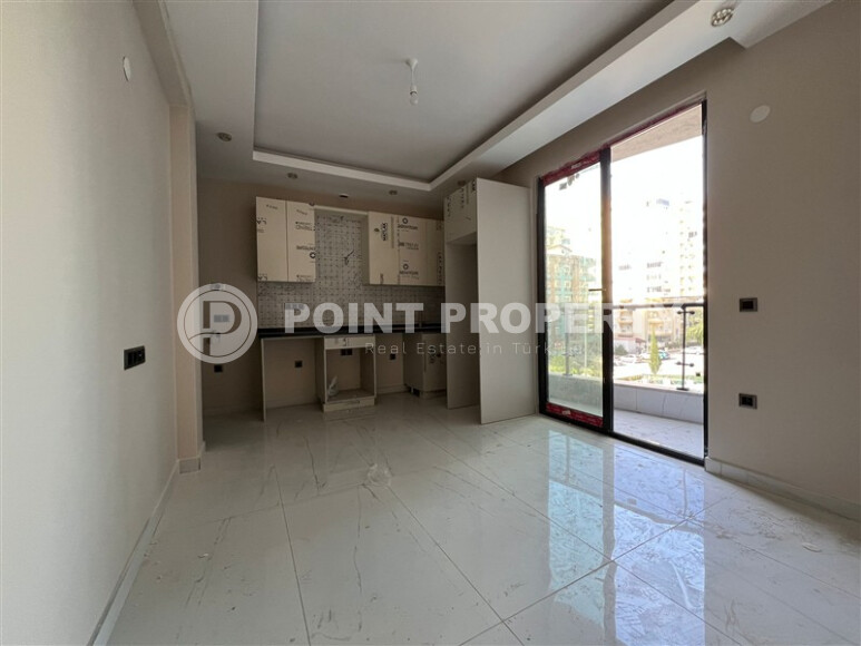 Квартира 1+1 в самом центре района Махмутлар у знаменитых часов-id-9235-фото-2