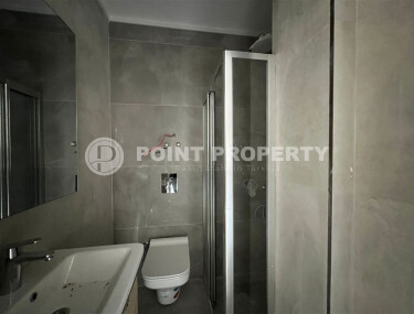 Квартира 1+1 в самом центре района Махмутлар у знаменитых часов-id-9235-фото-4