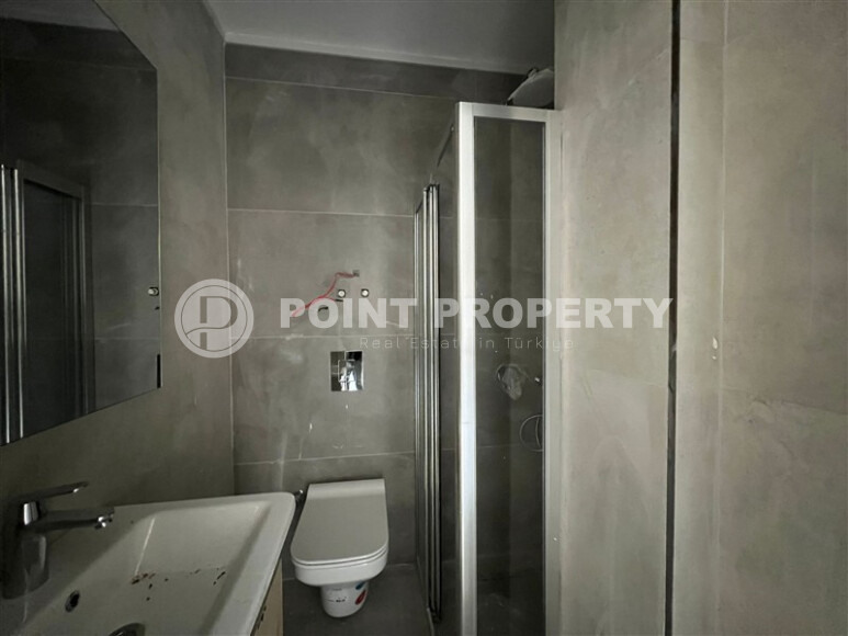 Квартира 1+1 в самом центре района Махмутлар у знаменитых часов-id-9235-фото-4