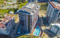 Светлая квартира 110 м² с отдельной кухней в Махмутларе-id-9263-фото-13