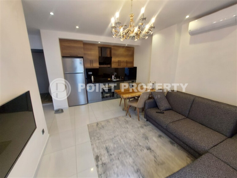 Квартира 1+1, 55 м² в комплексе с инфраструктурой отельного типа в Махмутларе-id-9264-фото-2