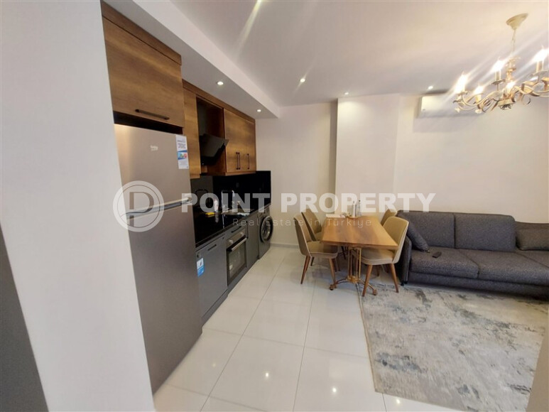 Квартира 1+1, 55 м² в комплексе с инфраструктурой отельного типа в Махмутларе-id-9264-фото-3