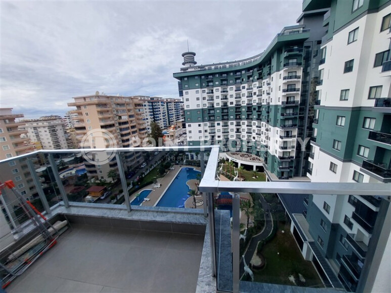 Квартира 1+1, 55 м² в комплексе с инфраструктурой отельного типа в Махмутларе-id-9264-фото-9