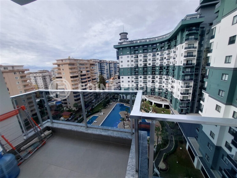 Квартира 1+1, 55 м² в комплексе с инфраструктурой отельного типа в Махмутларе-id-9264-фото-11