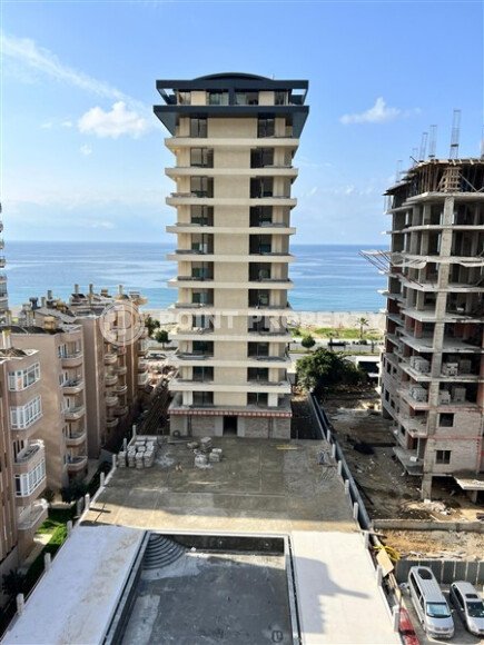 Видовая квартира 2+1 в новом комплексе на первой линии в Махмутларе-id-9289-фото-12