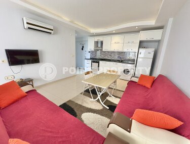 Apartment 1+1 in a complex within walking distance to the sea in Mahmutlar-id-9290-photo-2