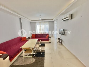 Apartment 1+1 in a complex within walking distance to the sea in Mahmutlar-id-9290-photo-3