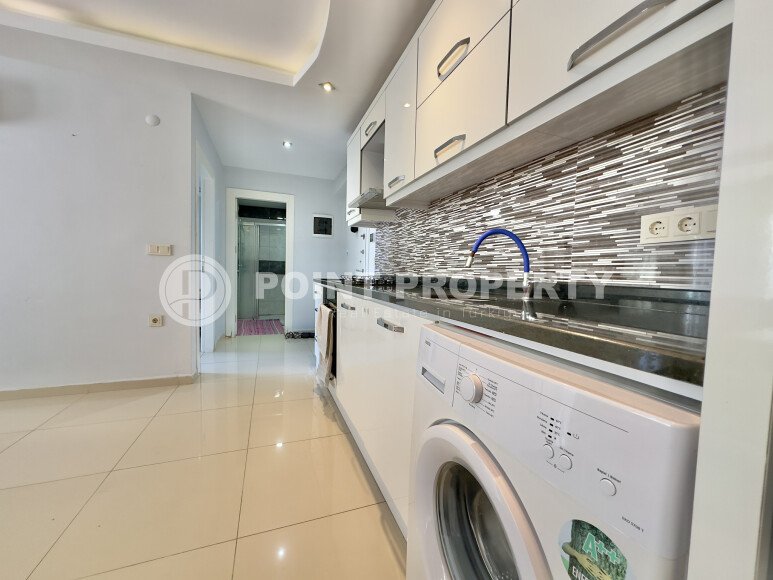 Квартира 1+1 в комплексе в шаговой доступности к морю в Махмутларе-id-9290-фото-7