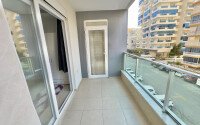 Apartment 1+1 in a complex within walking distance to the sea in Mahmutlar-id-9290-photo-9