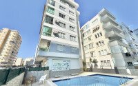 Apartment 1+1 in a complex within walking distance to the sea in Mahmutlar-id-9290-photo-10