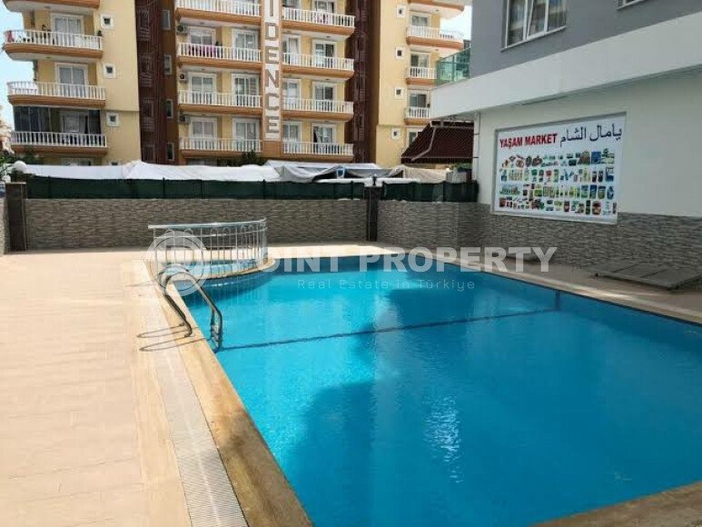 Квартира 1+1 в комплексе в шаговой доступности к морю в Махмутларе-id-9290-фото-11