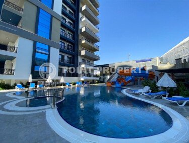 Современная квартира 50 м² в престижном комплексе в Махмутларе-id-9299-фото-1