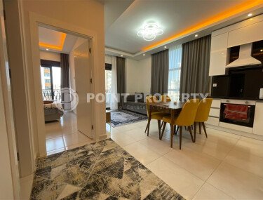 Современная квартира 50 м² в престижном комплексе в Махмутларе-id-9299-фото-3