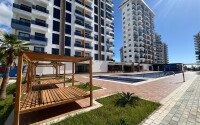 Новая квартира 70 м² в резиденции отельного типа в Махмутларе-id-9300-фото-1